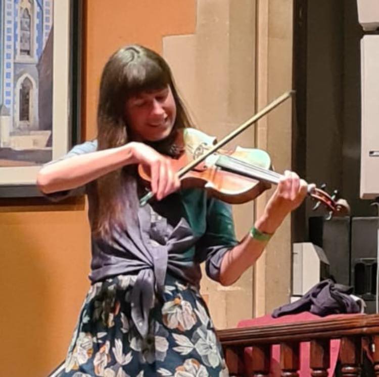 Lizzie playing the fiddle